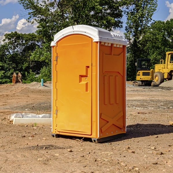 how often are the portable restrooms cleaned and serviced during a rental period in Aulander